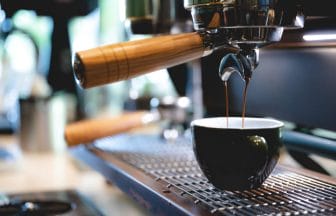 professional barista making espresso coffee to a drink cup in cafe beverage caffeine machine person pouring hot water with hand business in the morning breakfast fresh aroma in hot drink | コーヒーステーション