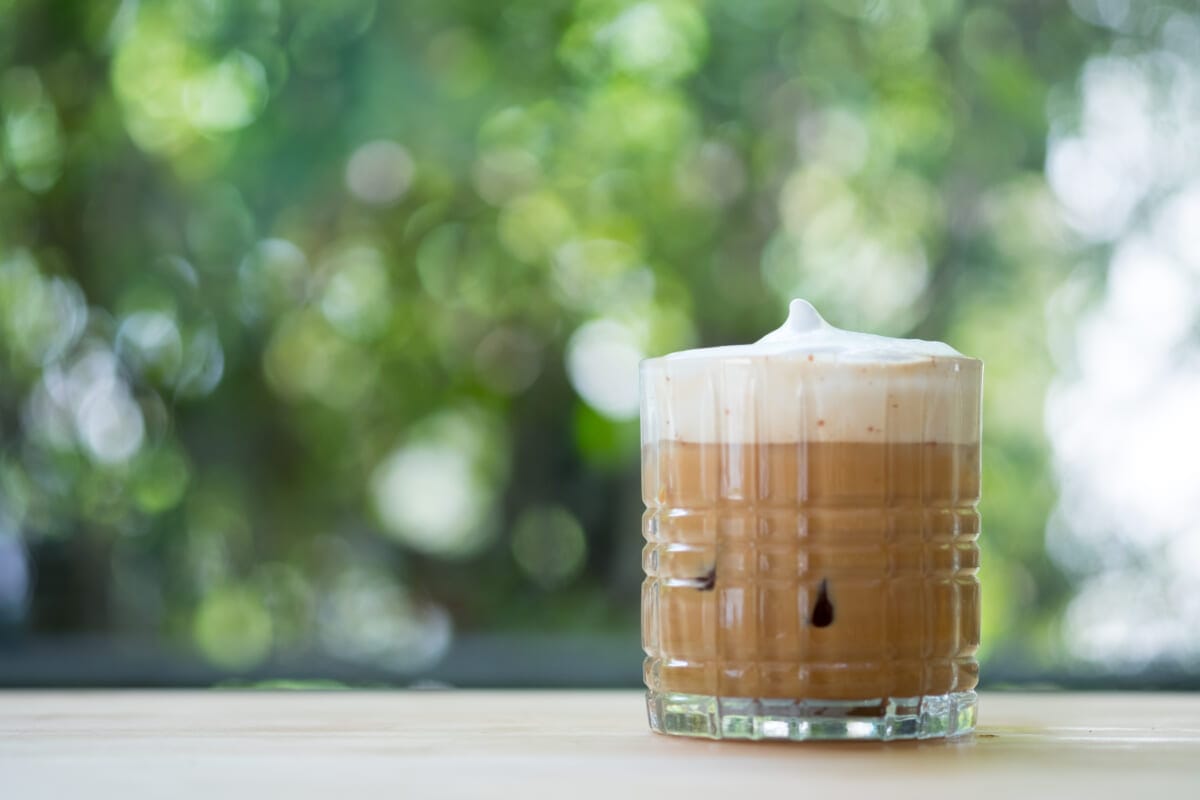 Iced cappuccino coffee with milk foam on top | コーヒーステーション