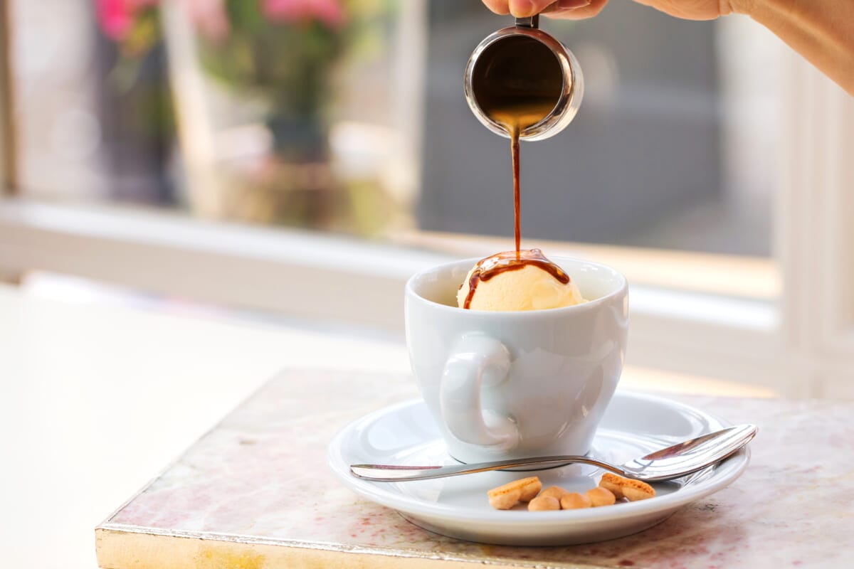 Affogato coffee with ice cream on a cup on marmor background | コーヒーステーション