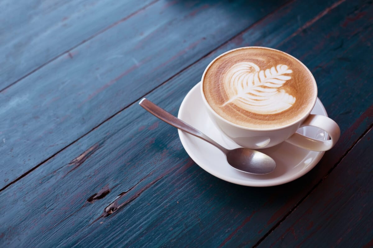 Cup of Hot Cappuccino coffee with fresh milk Arts surface float | コーヒーステーション