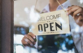 Young startup coffee cafe owener open and welcome customer | コーヒーステーション