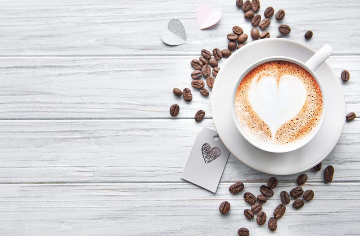 A cup of coffee with heart pattern | コーヒーステーション